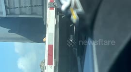 US: Rat Spotted Running on Flatbed Trailer While Driving on Highway