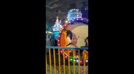Fairgoer left stuck as spinning barrel ride malfunctions