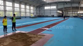 Missed long jump attempt during indoor training, Shanxi, China