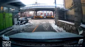 Scooter narrowly misses pedestrian on narrow road in Liaoning, China