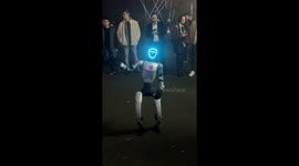 Dancing Robot Slaps Guy