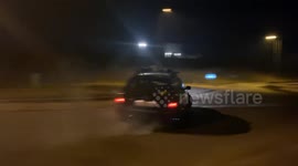 Roundabout drift king: nighttime car drifting spectacle!