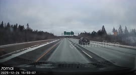 Car Driving on the Wrong Side of the Highway
