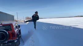 Instagram-style leap into fresh snow fails as it is all frozen