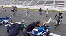 Shocking moment motorbikers crash at the start of race