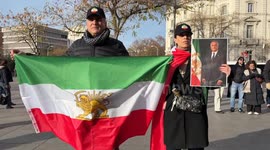 Iranians in Madrid demonstrate and demand the return of the Shah of Persia.