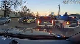 Police release dashcam footage showing protester 'faking being struck by patrol car'