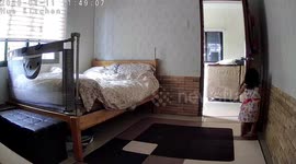 Cheeky toddler fools her mum by hiding behind bedroom door