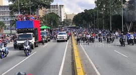 Bus, taxi, motorcycle drivers rally with vehicles in Caracas to demand Maduro release