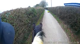 Velomobile passes rider and pony on Isle of Wight, England, UK
