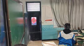 Water sprays like a fountain from broken radiator in classroom