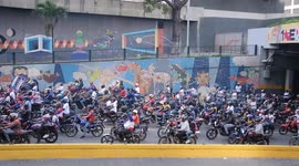 Protesters in Caracas demand release of Maduro and Flores
