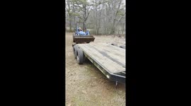 10-Year-Old Daughter Loading Tractor for Dad