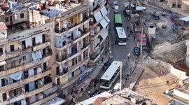 DRONE - Syrian families return home to Sheikh Maqsud after area cleared of SDF