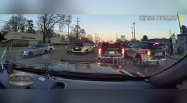 US: Anti-ICE Protester Lies In Front Of Police Car And Accuses Troopers Of Hitting Them