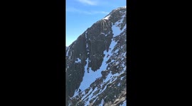 Two people slip on snowy mountainside in Yunnan, China