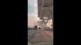 Crane plunges onto road killing two drivers following train tragedy in Thailand