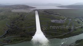 Dam gates open for flood control in California