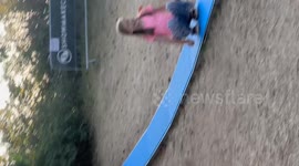 Germany: Man slips and falls on slide