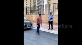 China: Two Chinese men drink alcohol while pulling car to avoid DUI