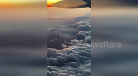 Chile: Plane Window Video Shows Massive Smoke Plumes From Argentine Wildfires