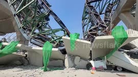 Two drivers killed when crane building elevated motorway falls onto road below