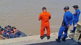 Rescue teams search for missing passenger from capsized boat in Indonesia