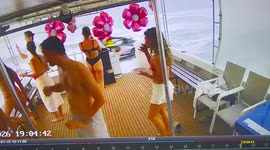 Huge splash from jet ski hits tourists on boat party