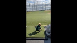 Little Man at the Driving Range