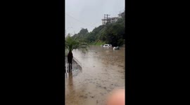 Cars Submerged During Flooding in Mission Hills, San Diego