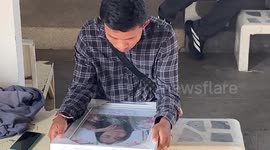 Grieving families collect bodies from Thailand train tragedy