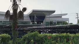 This golf course is built between two runways at an airport in Thailand