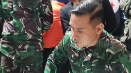 Search teams recover belongings of Indonesia plane crash victims