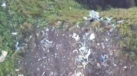 Search teams find Indonesia plane crash wreckage on mountain peak