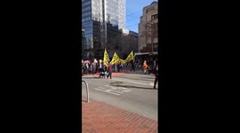 Small anti-ICE protest held on Market Street in San Francisco, USA
