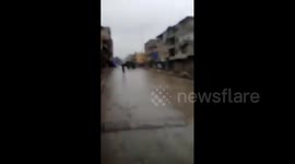 Syria, Ar Raqqah: Locals in Raqqa seize US-supplied Humvee vehicles of SDF/PKK group