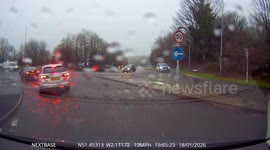 Close Call Caught on Camera: Roundabout Idiot Almost Causes Crash!