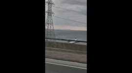 Toronto Skyline seen 50 km (31 mi) away from the Burlington Bay James N. Allen Skyway, caused by possible mirage