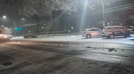Snowfall in Boston MA Brookline area Plow and Salt Trucks on the road plowing and salting USA