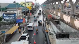 Sinkhole swallows car on road where crane collapsed killing two drivers
