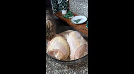 Playful cat resists tug-of-war in Lytle Creek, California, USA