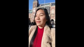 Crowds gather in Amsterdam to pick free flowers during National Tulip Day