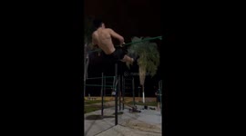Guy Flipping Over Bar Swings Off