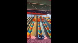 Children collide on amusement park slide in Guizhou, China