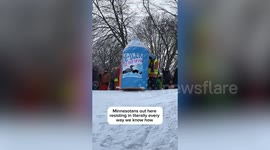 Anti-ICE protestors use annual sled art event to hit out at Trump