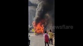 India, Mumbai: Bus carrying  catches fire on Western Express Highway in Mumbai