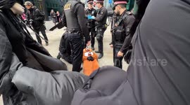 Extinction Rebellion stage protest in London opposing Farnborough airport expansion