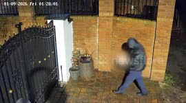 Disturbing moment pig's head mounted on gates of Muslim family home caught on CCTV