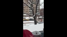 BMW driver blocks traffic to help elderly woman cross street in Moscow, Russia