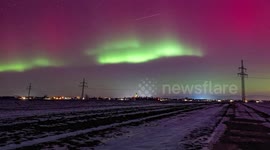 UNCAPTIONED: Northern Lights Paint UK Skies With Pink and Green Glow